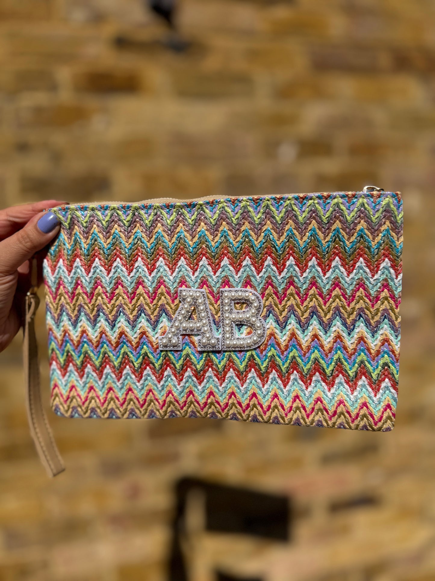 Chevron straw clutch bag