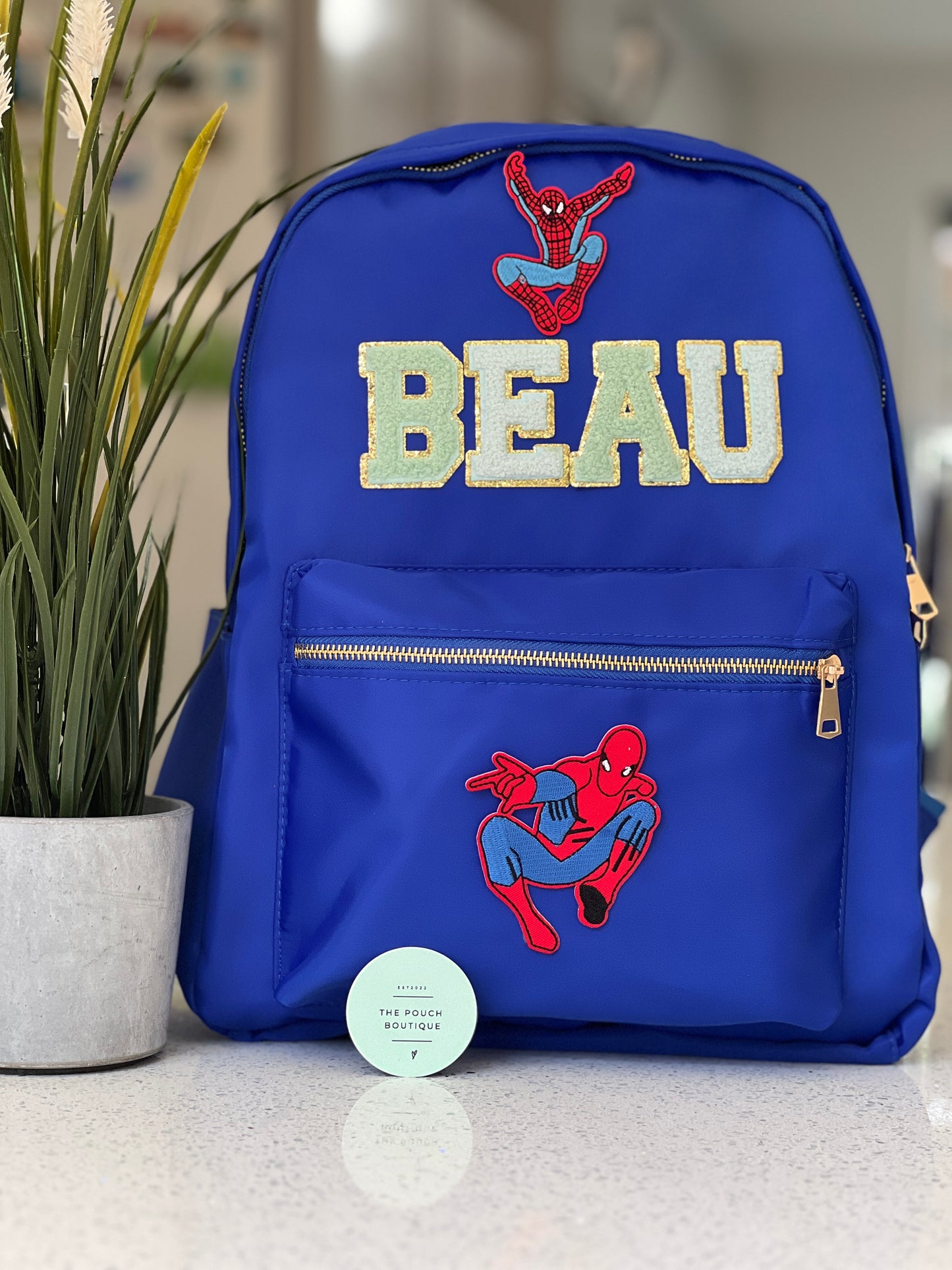 Best selling backpack with patch letter & motifs