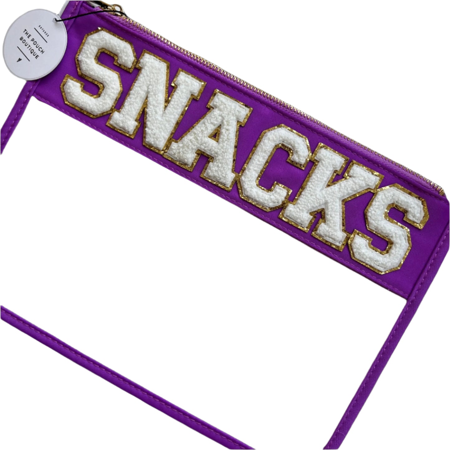 A clear plastic pouch with purple patch letters spelling out the word 'SNACKS' in a bold, decorative font.