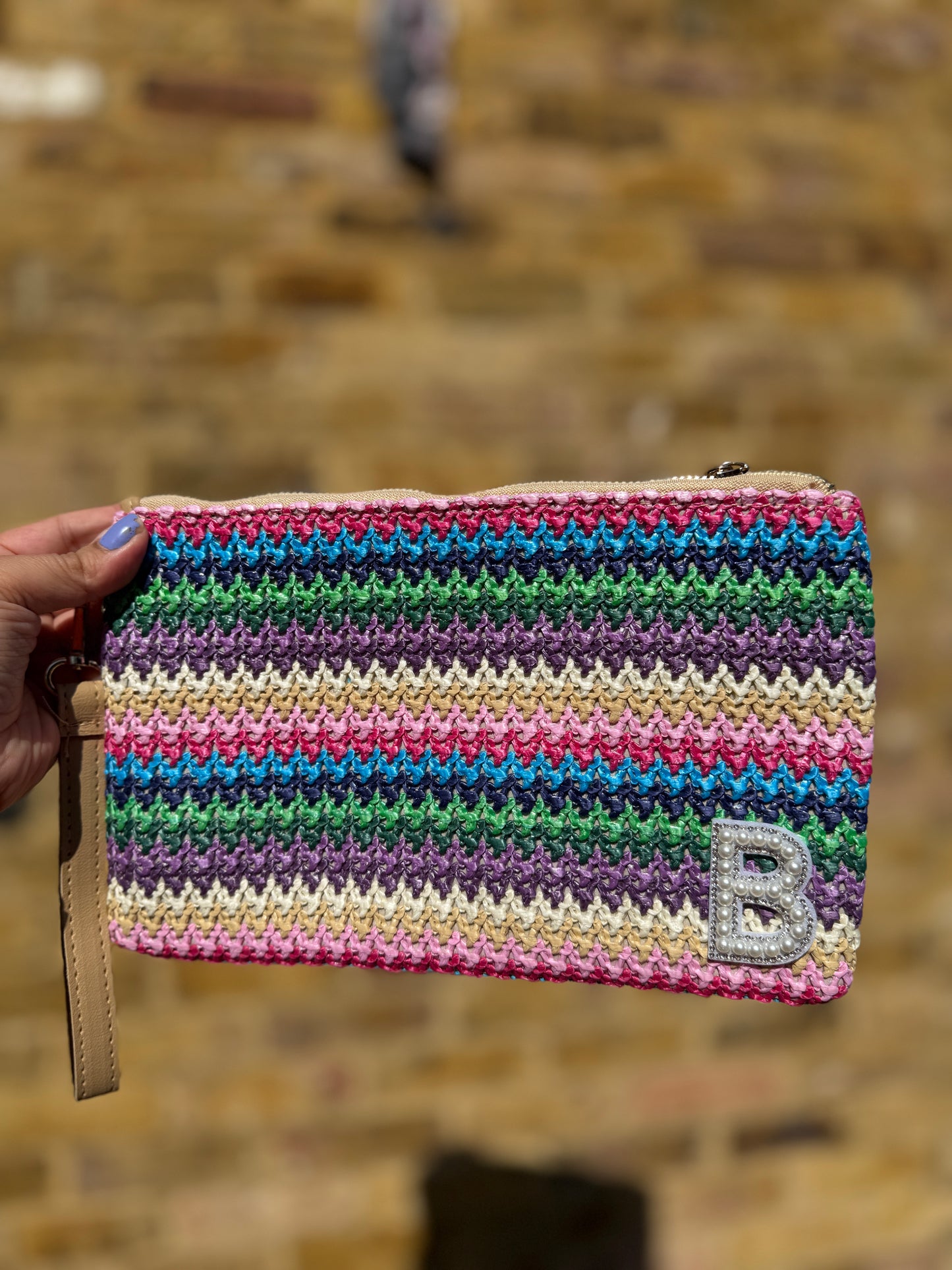 Rainbow straw clutch bag
