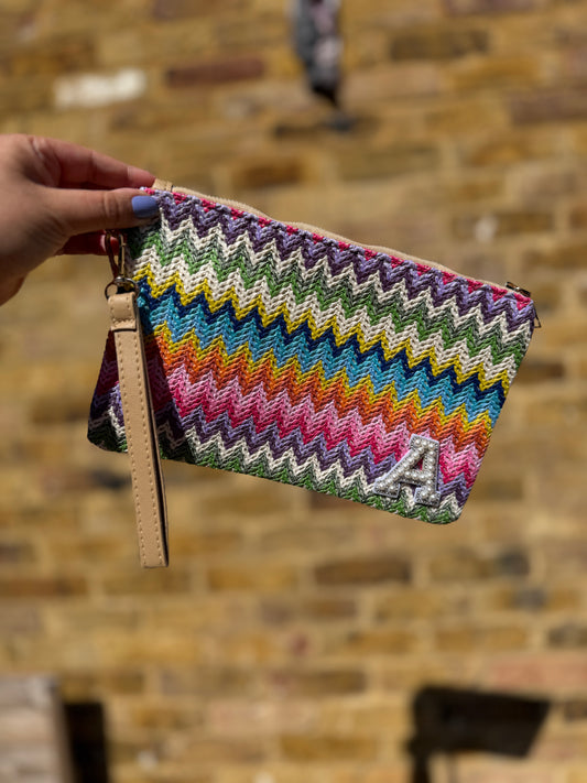 Multi coloured chevron straw clutch bag