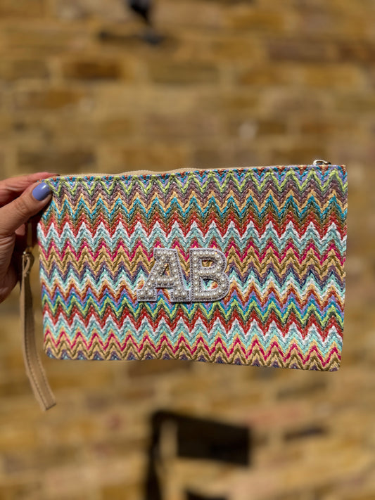 Chevron straw clutch bag