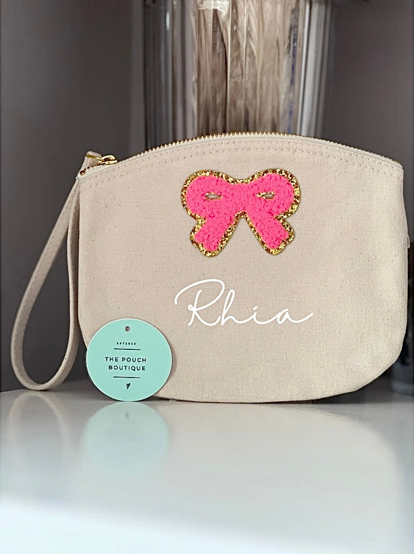 Personalised wristlet zipper coin purse with a bow